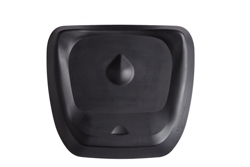 Black Topo standing desk mat viewed from above, showing raised edges and a central teardrop-shaped mound.